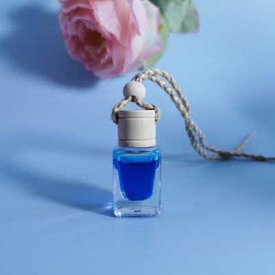 China Cosmetic Aromatherapy Air Freshener Car Diffuser 8ml Perfume Essential Oil Pendant Glass Hanging Perfume Bottle for sale