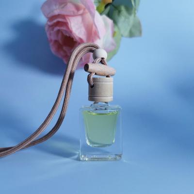 China Hanging Car 11ml Cosmetic Essential Oil Perfume Aromatherapy Diffuser Bottle Hanging Empty Diffuser Bottle for sale