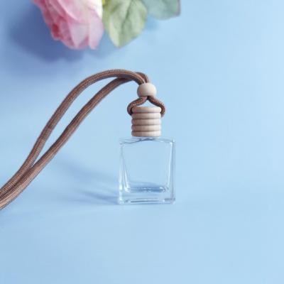 China Square 10ml Empty Wooden Hang Rope Cover Diffuser Car Perfume Bottle Cosmetic for sale