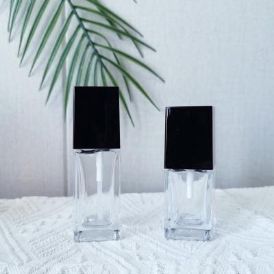 China 25ml 35ml Square Makeup Clear Empty Cosmetic Glass Bottle Base Pump Glass Liquid Bottle for sale