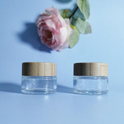 China Cosmetic Glass Jar Containers Bamboo Cream Jar Frosted Glass Jar With Bamboo Wood Lid for sale