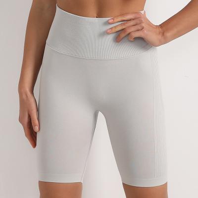 China Antibacterial Women Seamless High Waist Biker Yoga Shorts With Pockets Workout Spandex Tummy Control Shorts for sale