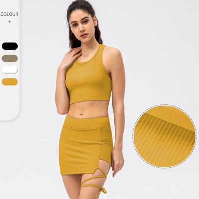 China Women Breathable Sexy Summer Crop Tank Top Tennis Mini Two Piece Solid Yoga Sporty Skirt Set for sale