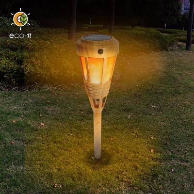 China Garden Patented Wood Grain Decor LED Outdoor Bamboo Torch Flame Solar Garden Stake Lights For Pathway for sale