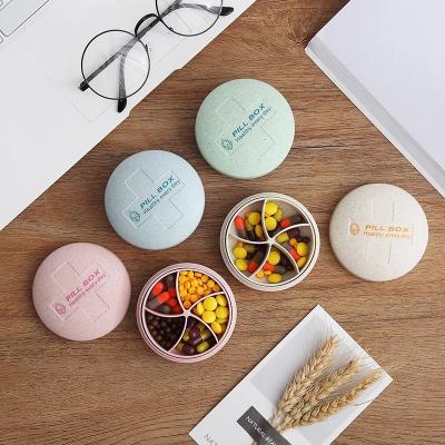 China 2019 Newest Hot Selling Amazon Ebay Wheat Straw Round Shape 5 Compartment Pocket Travel Pill Box Portable Pill Box Case 75*40mm Small for sale