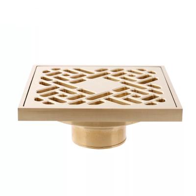 China Newest Gold Color Brass Metal Square Strainer Luxury Bathroom Floor Drain for sale