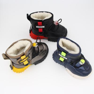 China Thermal Kids Snow Winter Frosty Warm Anti-Slip Boots Waterproof Fur Lined Boots for sale