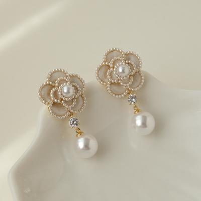 China Camellia Designer Earings Collection Luxury Material Designer Friendly Jewelry Rhinestone Stainless Steel Flower Pearl Latest Earring Catalog for sale