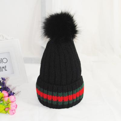 China Winter Friendly Material Warm Hat Thickened Stripe Knitted Hat Wool Yarn Outdoor Hair Ball Climbing Luxury Designer Unisex Warm Hat Headwear for sale