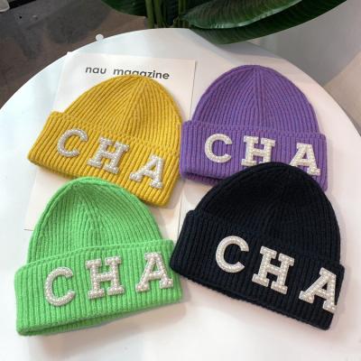 China Wool Friendly Material Crystal Diamond Letter Beanie Knitted Outdoor Yarn Winter Hat Designer Cycling Headwear Luxury Fashion Warm Hats for sale