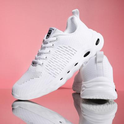 China Fashion Trend Wholesale Fly Knitted Women Upper Sports Sneakers Sneakers Running Shoes for sale