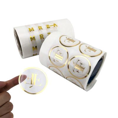 China Custom Decorative Sticker Gold Foil Stamping Clear Logo Printing Printed Transparent Stickers Clear for sale