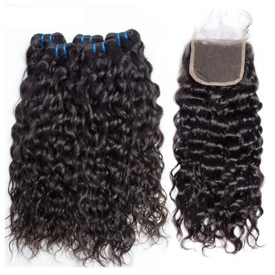 China Curly Curly Deep Wave Bundles With Closure Wholesale 10a Grade Virgin Human Hair Peruvian Hair Bundles With Lace Closure for sale