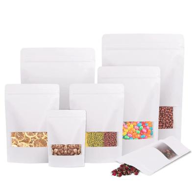 China Recyclable Resealable Coffee Bean Food Snack Seeds Flat Packing Plain Black Kraft Paper Holder Up Pouch With Window for sale