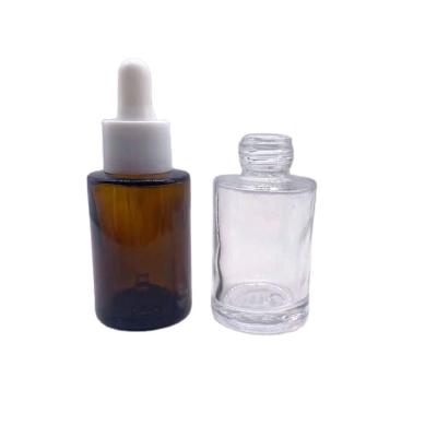 China Personal Care OEM 20ml 30ml Flat Shoulder Clear Dropper Bottle For Serum Aroma Perfume Oil for sale