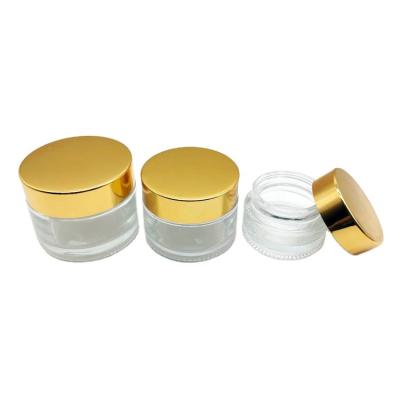 China Wholesale High Quality Clear Personal Care Cream Glass Bottle 20g 30g 50g With Gold Screw Top for sale