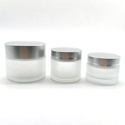 China High Quality Free Sample 3g 5g 10g 15g 20g Personal Care Glass Cosmetic Cream Jar With Colorful Lid for sale