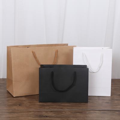 China Recyclable High End Luxury Logo White Black Craft Carry Custom Paper Bags From Kraft Paper Gift Bag Manufacturers For Clothing Promotion for sale