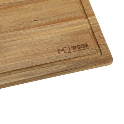 China Rectangle Disposable Cutting Board Good Quality Natural Acacia Wood Juice Groove Cutting Board for sale