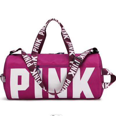 China Fashion Customized Large Capacity Pink Logo Gym Women Waterproof Duffel Bags Sports Travel Bag for sale