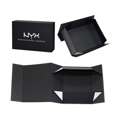 China Recyclable Custom Logo Luxury Cardboard Magnetic Folding Gift Box With Ribbon Closure for sale