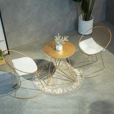 China EUROPEAN Nordic iron art balcony small simple leisure milk tea shop cafe sunshine room round table and chair combination coffee table for sale