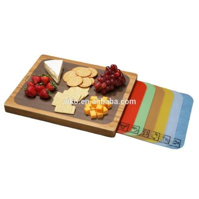 China Disposable bamboo cutting board with 7 removable cutting mats for sale