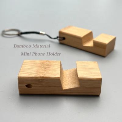 China 2022 waterproof new bamboo key chain phone holder for mobile phone and mobile phone to free your hands for sale