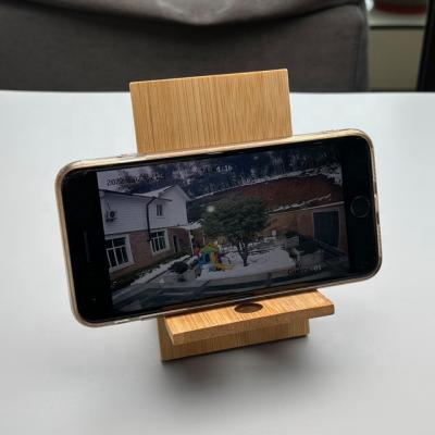 China Eco Friendly 2022 New Product Wood Material Item Bamboo Eco Friendly Phone Holder for sale