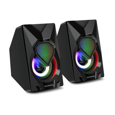 China Small dynamic steel gun speaker bass desktop computer function light effect phone stereo LED stereo sound is in its environment for sale