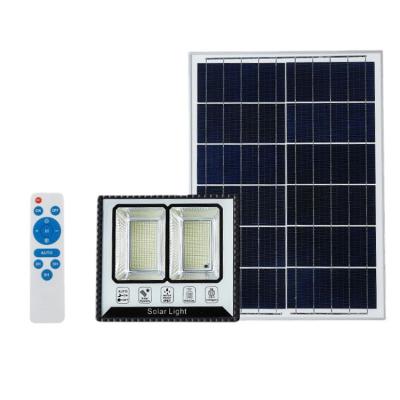 China Warehouse OEM Energy Saving High Lumen Ip66 Ip67 Integrated Two Solar Panel Led Flood Light Aluminum Solar Flood Light Outdoor 100W for sale