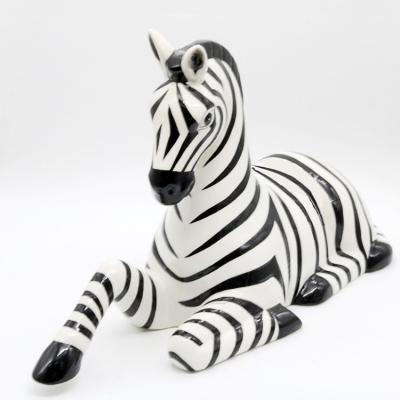 China Handcrafted Ornaments Modern Porcelain Sculptural Zebra Statue Zebra House Figures Interior Home Decoration for sale