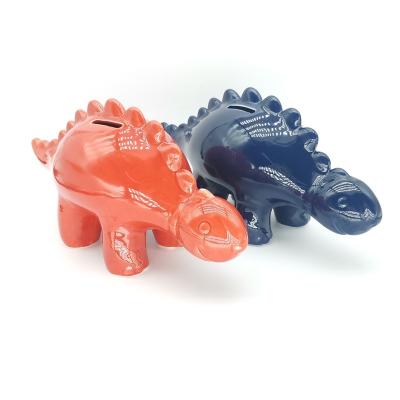 China Eco-friendly Wholesale Animal Dinosaur Form Piggy Bank Piggy Banks Atmosphere For Kids for sale