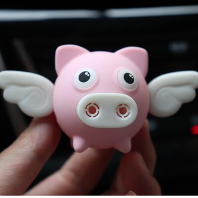 China Brief & Single Color Car Aroma Diffuser Toggle Wing Angel Piglet Vent Clip Car Air Freshener Smell Decoration Toy Car Accessories for sale