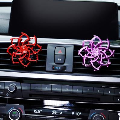 China Purify the air inside the car new car air freshener can spin spider air conditioning outlet aromatherapy clip car aromatherapy cream for sale