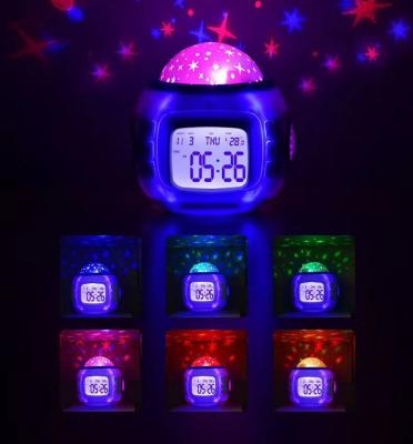 China Bedroom Kids Sky Star Night Light Projector Lamp Alarm Clock with Music Kids Christmas Gift Clock Night Lights for sale