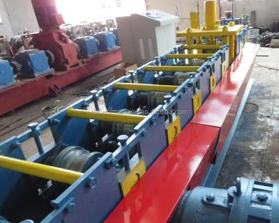 China Industrial aluminum building material shops garage door roller shutter door roll forming machine-machine for sale