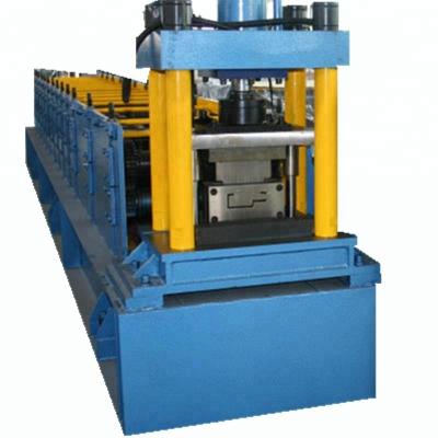 China Hotels Metal C Purlin Steel Door Frame Roll Forming Machine With Hinge Keyhole for sale