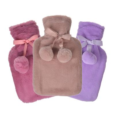 China Pink FLANNEL Hot Water Bottle with Solid Color Fleece Cover with Pompom for sale