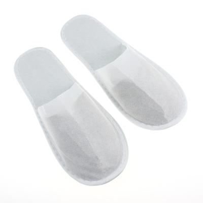 China New Quick Dry Disposable Compressed Soft Comfortable Disposable Hotel Slippers for sale