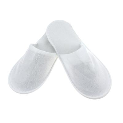 China Low price quick-drying disposable compressed wholesale luxury towel PVC unique hotel spa slippers for guests to provide various models for sale