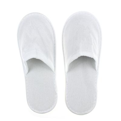 China High quality cheap nonwoven compressed disposable quick dry SPA hotel guest slippers for sale