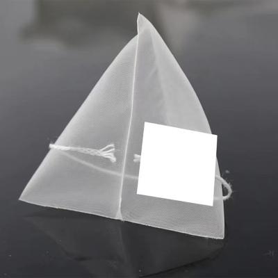 China Reusable Tea Corn Biodegradable Fiber Pla Tea Filter Bag Pyramid Bag With Suction String for sale