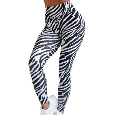 China New lightweight women's high waist stretch tight running exercise pants quick-drying yoga pants zebra print fitness pants for sale