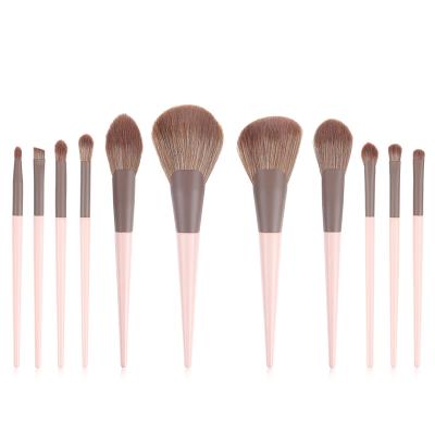 China Angular Blush Latest Design Fashion Fantasy Matte Pink Makeup Brushes With Professional Pink Bag for sale