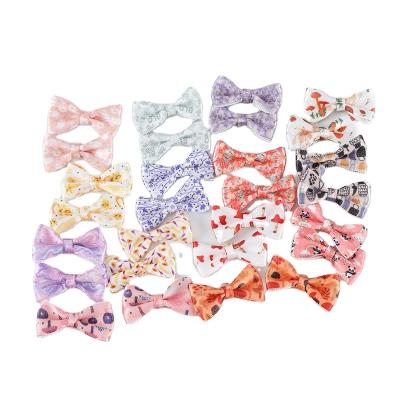 China Recyled wholesale 30mm mini underwear cartoon pattern printing small satin ribbon bow for bra underwear decoration snack fancy packaging for sale