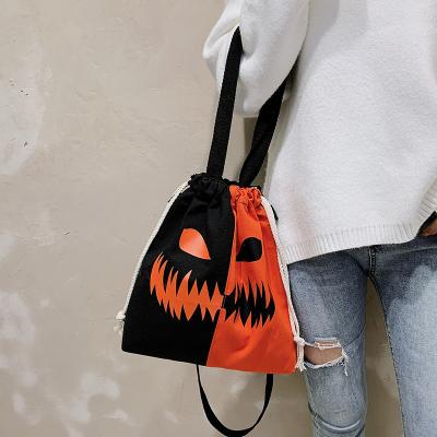 China Halloween Carnival Creative Pumpkin Ghost Pattern Shoulder Canvas Printed Single Tote Bag With Drawstring for sale