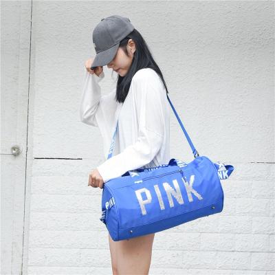 China Custom Fashion Shiny Letter OEM Ladies Ladies Men's Travel Bags With Shoe Compartment Women GYM Pink Duffel Bag for sale