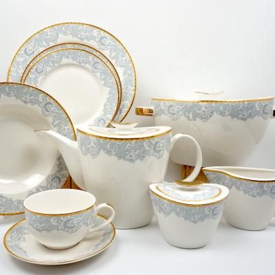 China Posuda Sustainable Light Blue Luxury Dining Dish Set Porcelain Pots With Gold Rim for sale