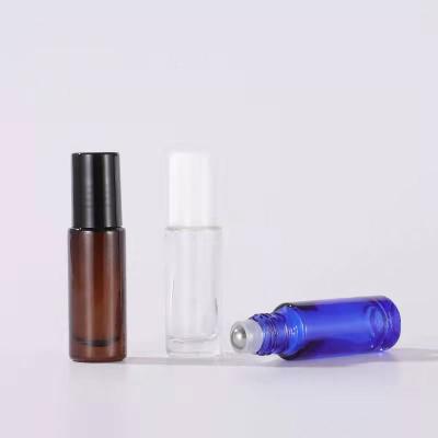 China 2021 cosmetics wholesale high quality colorful glass bottle with roller balls for sale